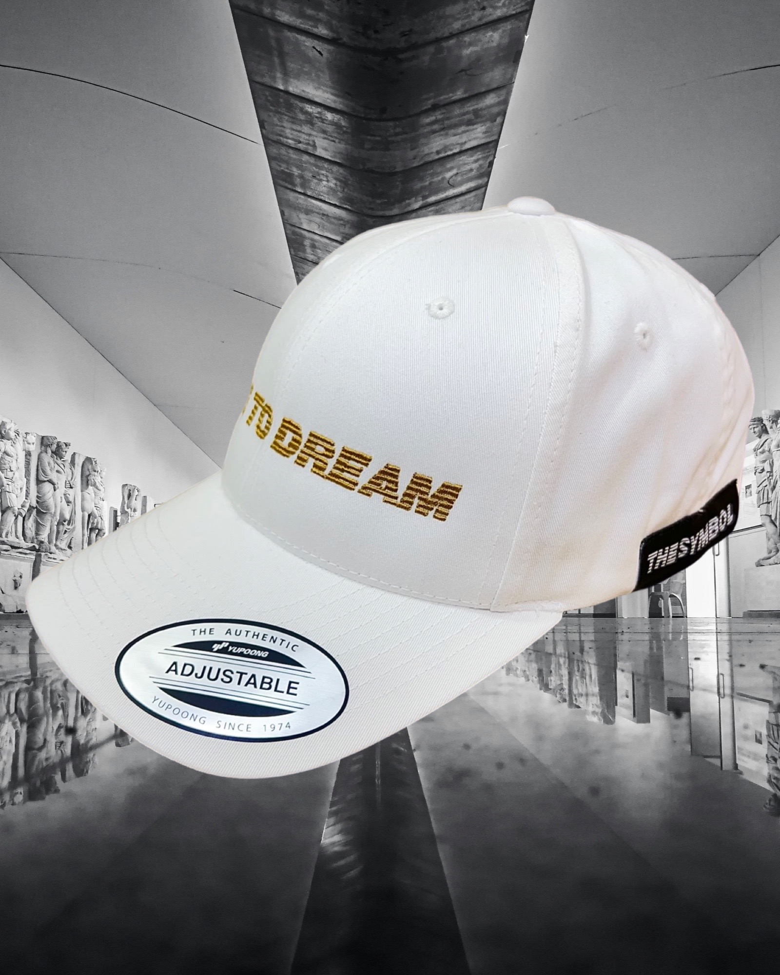 THE SYMBOL Dare To Dream Embroidery Baseball Cap White/Gold
